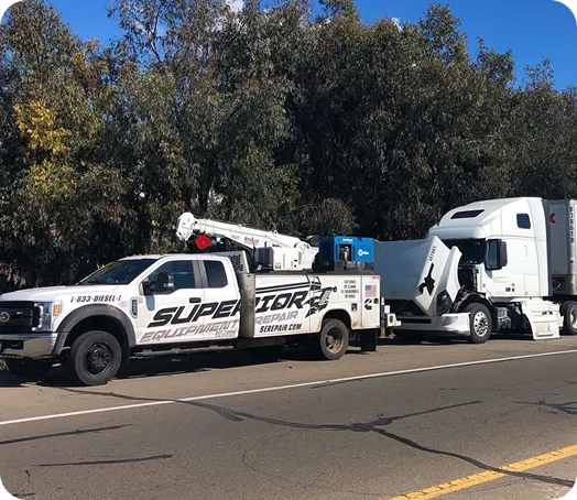 Heavy-duty roadside truck repair service assisting a semi truck on an Idaho highway